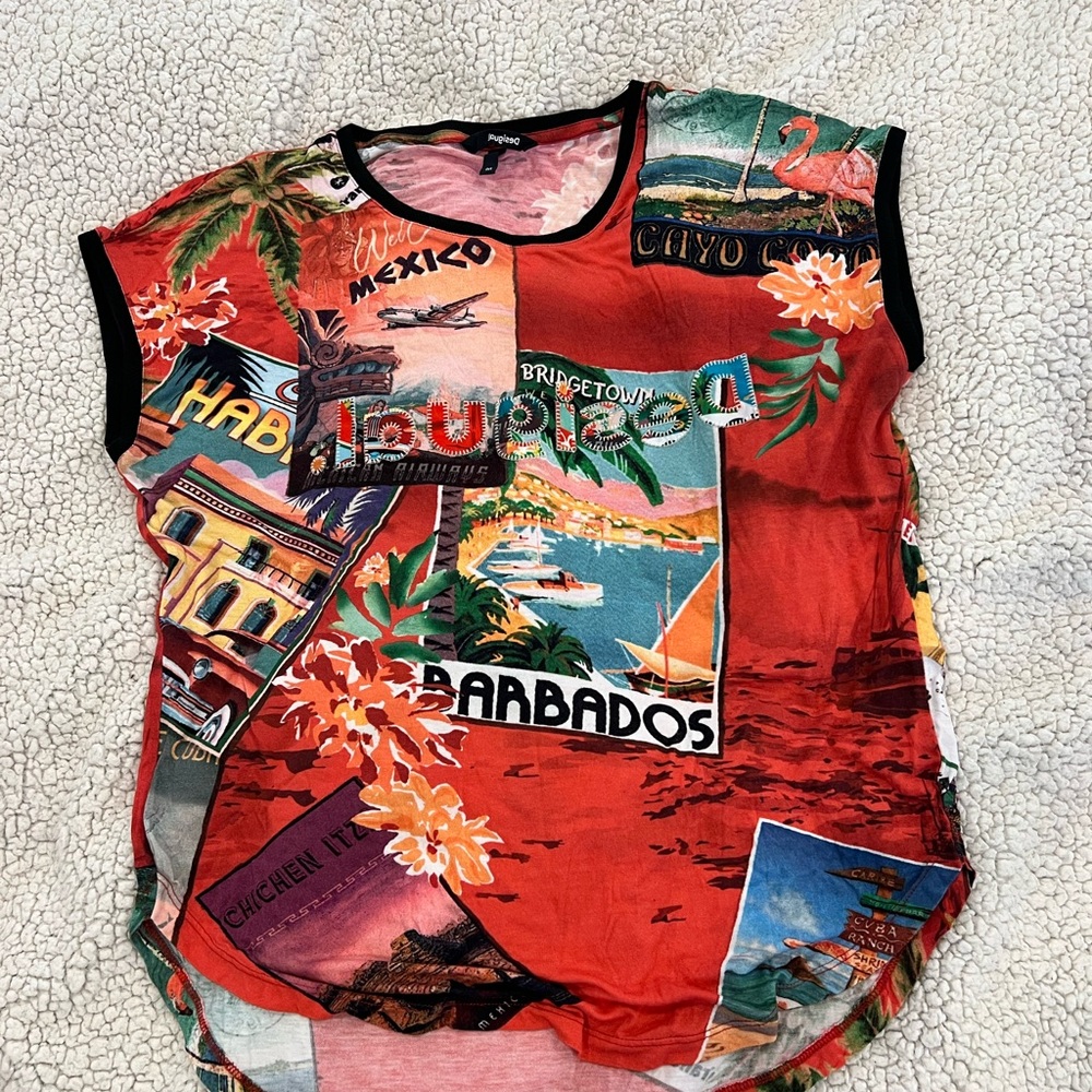 Desigual jersey style top in bright hues of red black and blue.  Like new.